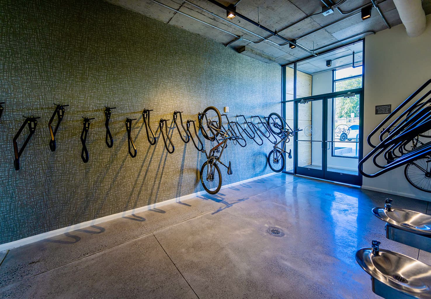 Vertical bike racks on wall