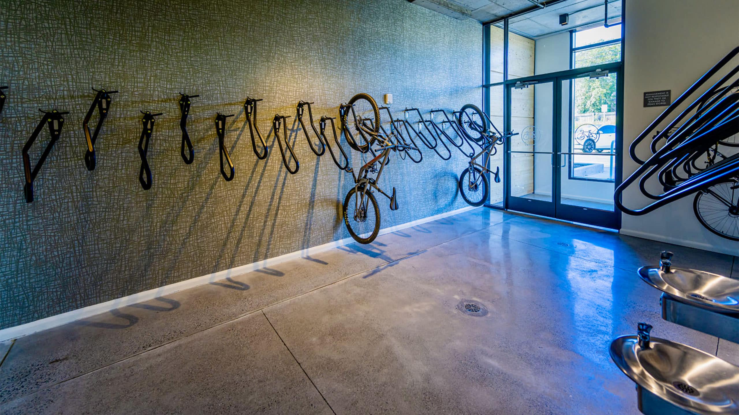 Vertical bike racks on wall